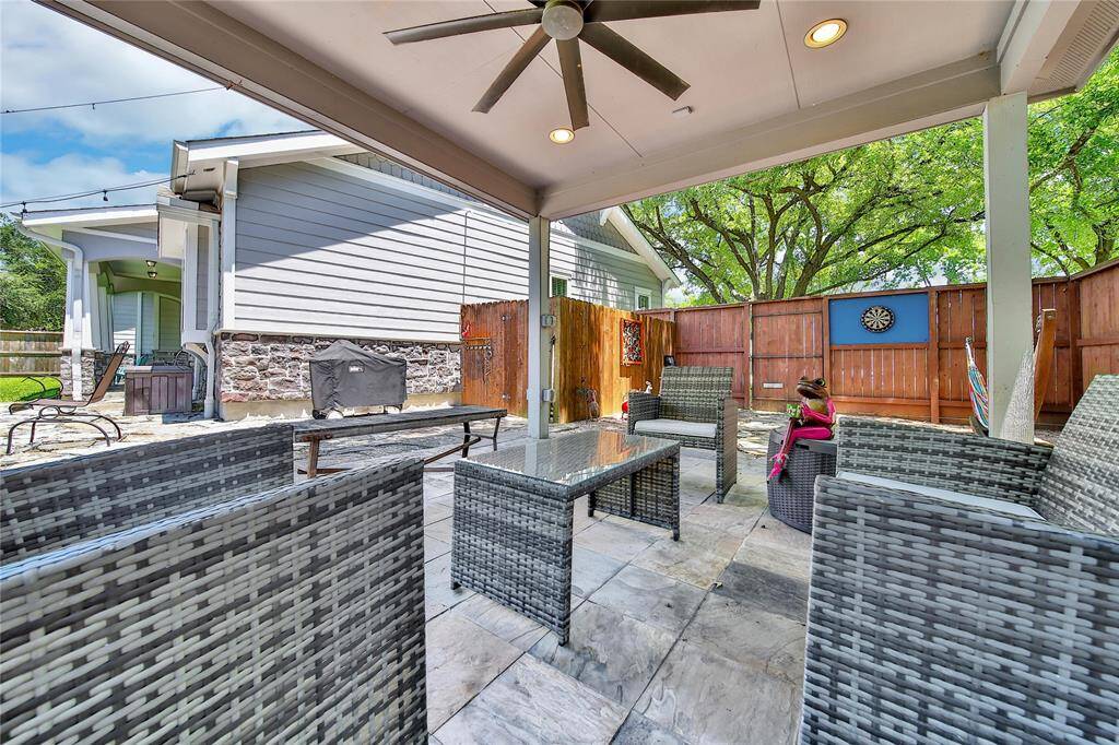 Additional covered back patio and fire pit which is great for hosting!