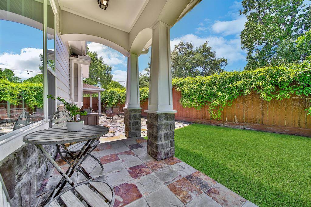 Covered seating on your back porch for enjoying your morning coffee.