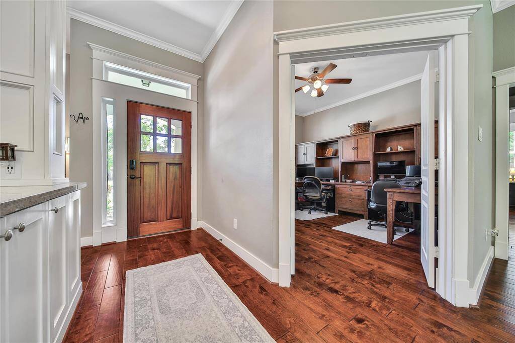 Beautiful entryway with dedicated home office.