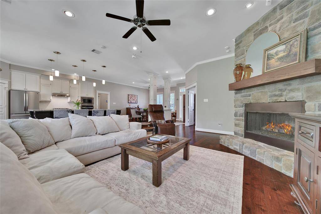 Gorgeous family room with gas fireplace and plenty of room for gatherings.