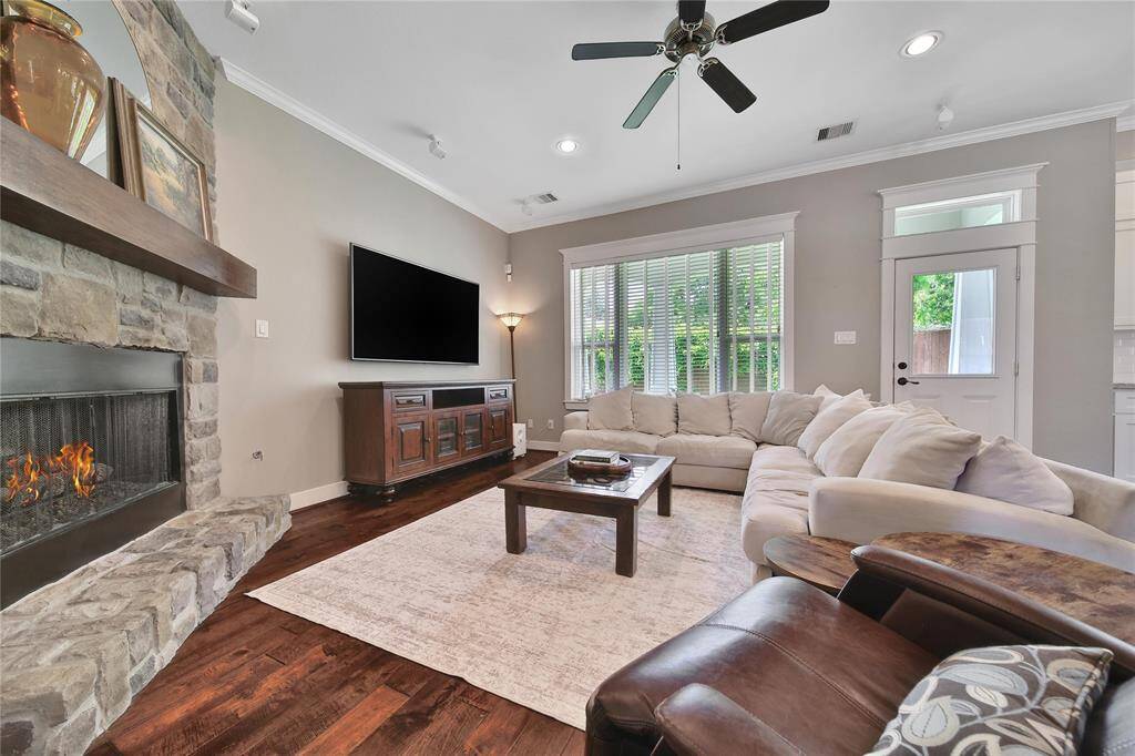 Gorgeous family room with gas fireplace and plenty of room for gatherings.