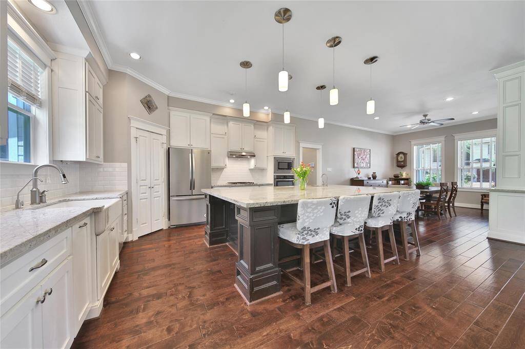 Stunning kitchen opens up to the family room.