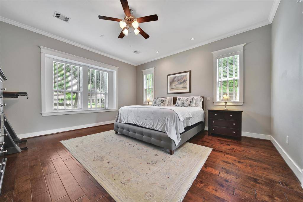 Expansive primary bedroom with ensuite bathroom.