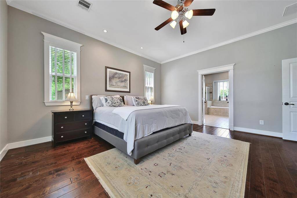 Expansive primary bedroom with ensuite bathroom.
