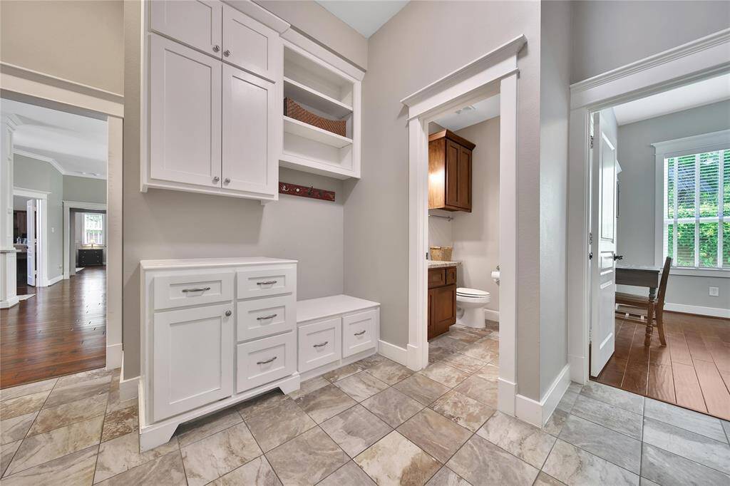 Additional mudroom storage off the garage.