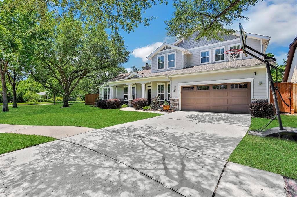 This property features a two car attached garage and cozy front porch.