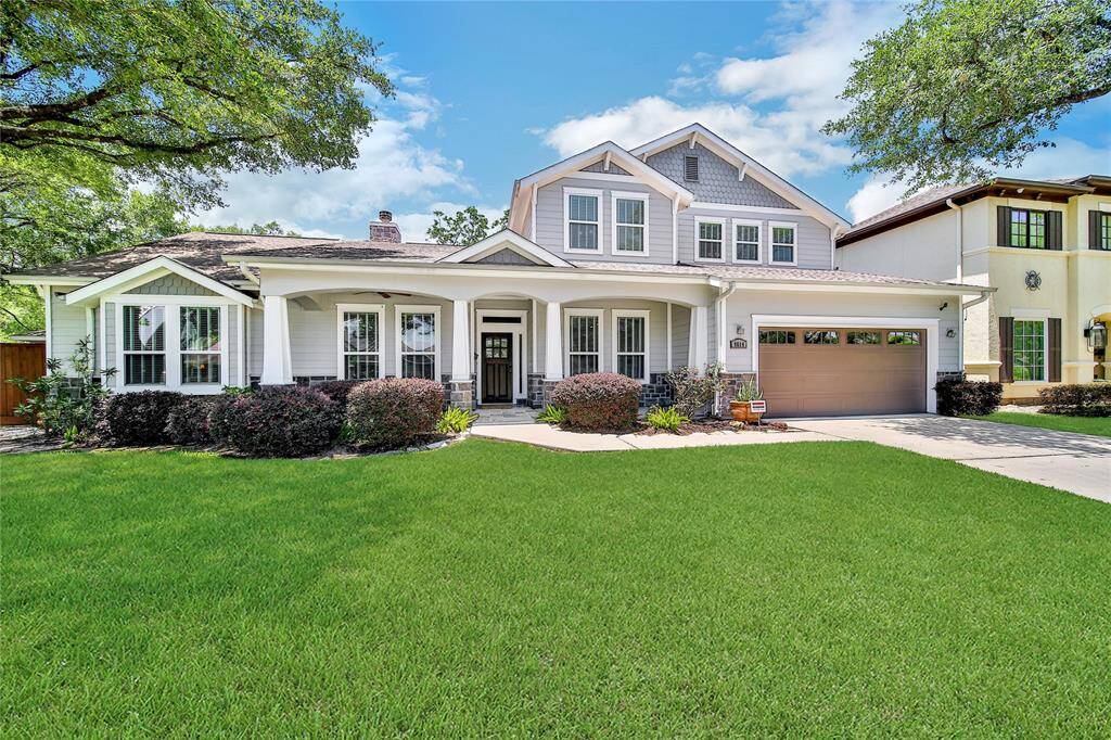 This property features a two car attached garage and cozy front porch.