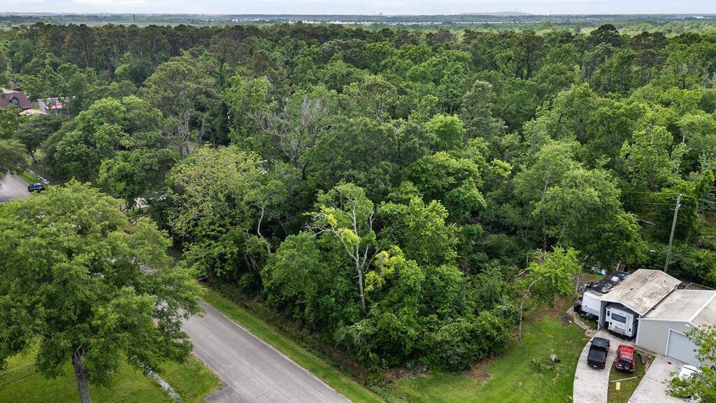 Property backs up to wooded area.