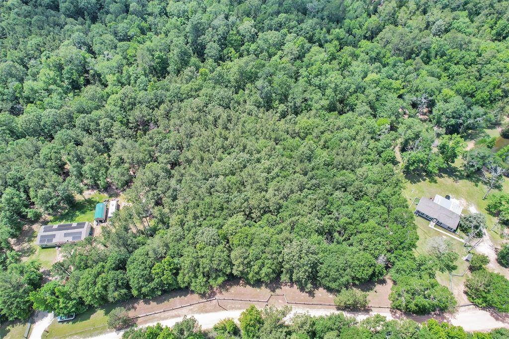Aerial view from the front of the lot. Neighbors on each side