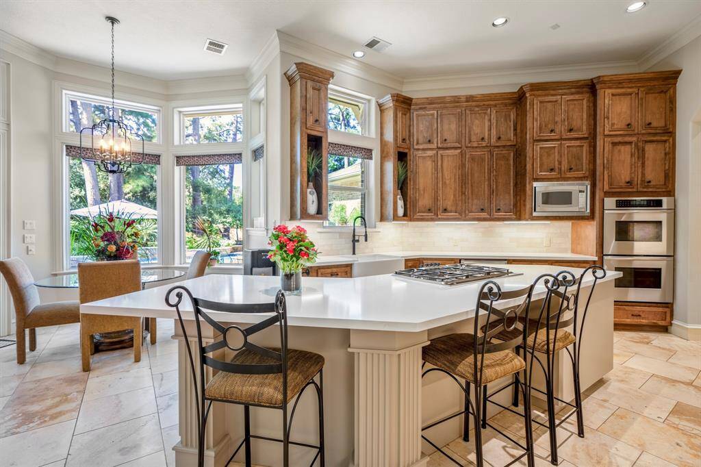 This home is perfect for entertaining with an easy flow and lots of special features to catch the eye, as you will notice with the pendant lighting in the breakfast room which reflects lighting into the dining area.