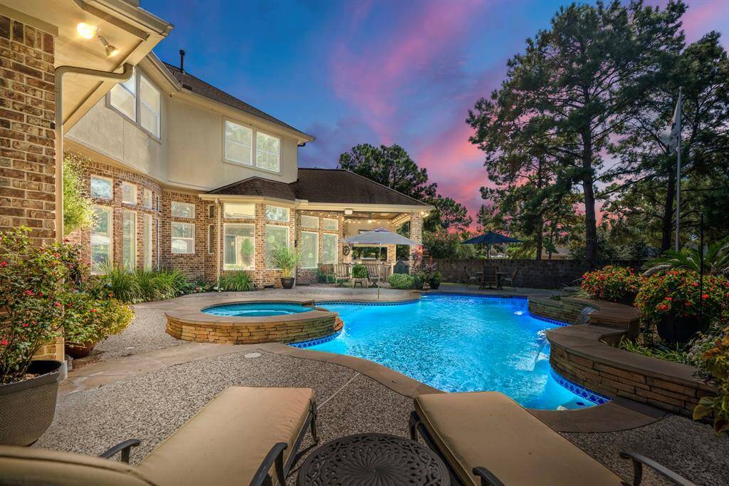 You are going to love entertaining year-round in this gorgeous backyard, with sparkling pool, raised spa surrounded by easy to maintain landscaping, and patio that serves as a welcoming area for entertaining and enjoy those warm Texas evenings.
