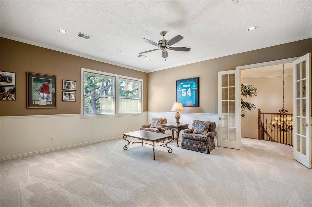 This massive gameroom will work any configuration of game or entertainment needs, with French doors and two toned paint effect, you are only limited by your imagination.