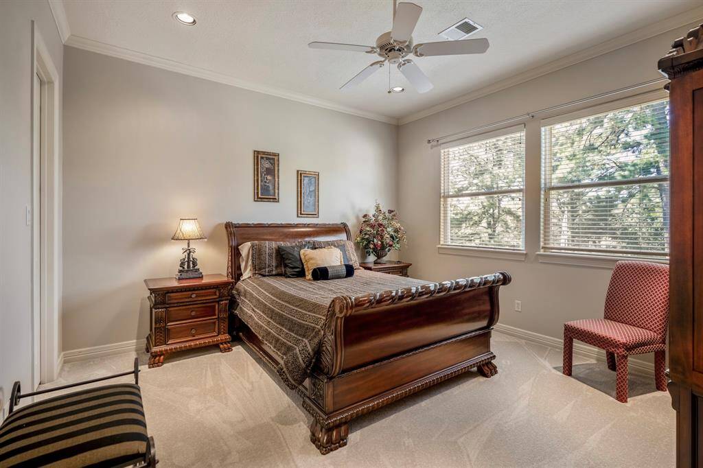Bedroom number three has plush carpets, neutral tones, and large windows that stream in natural light, as well as offering lovely views.