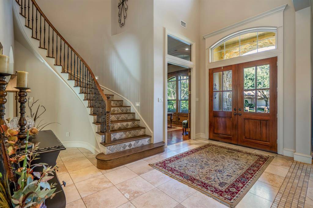 This custom home is everything you could DREAM about, with hidden special details including a Texas basement which is ideal for a nursery, craft room, and other features you need to see to appreciate.