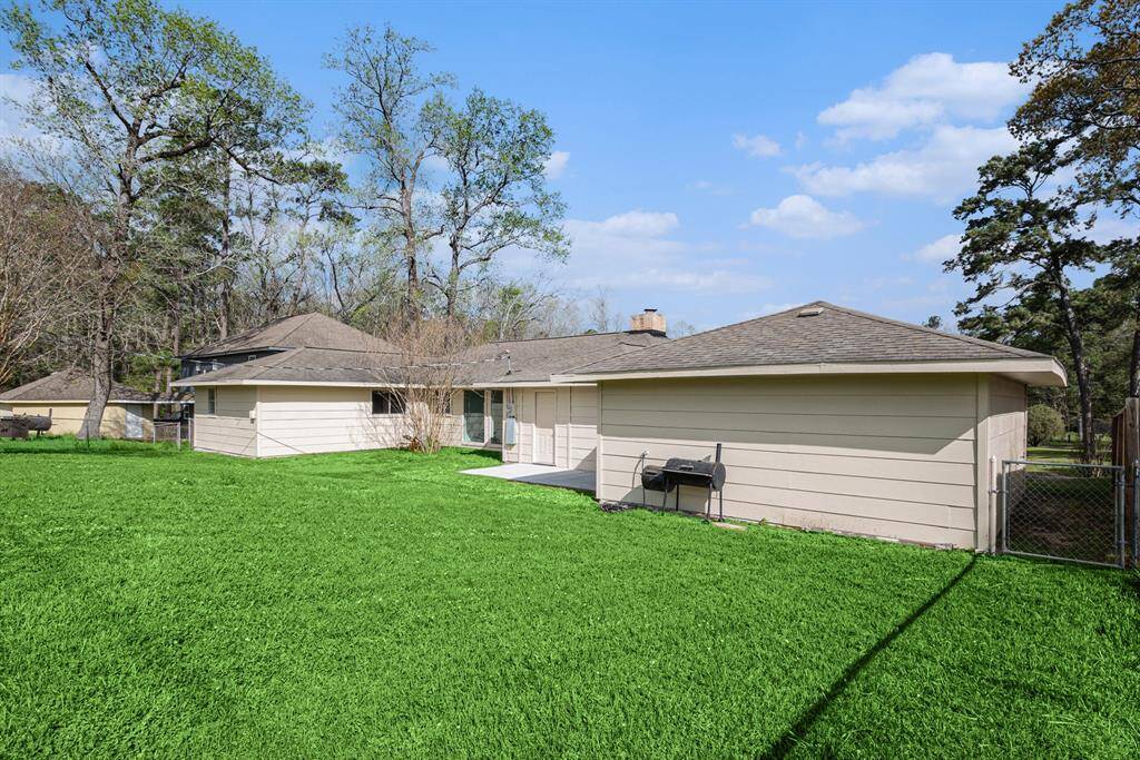 Tons of room for entertaining! Backyard also has a dug-out fire pit.