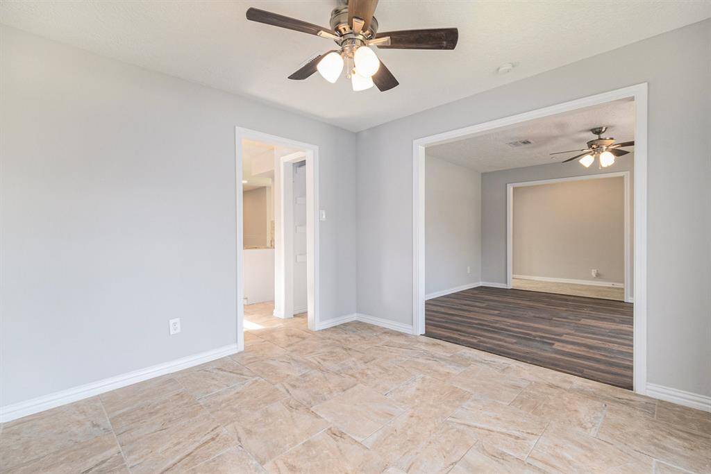 This angle from the formal dining looks into the study (right) and kitchen (left)