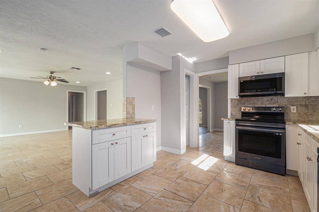 A glance from the kitchen to the living room.