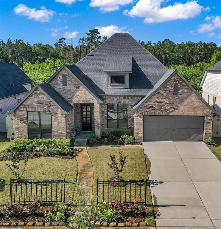 Welcome home to 10066 Preserve Way. The lush landscaping accent this stately home that offers 5 bedrooms, 4 bathrooms, study, and spectacular views of the nature preserve