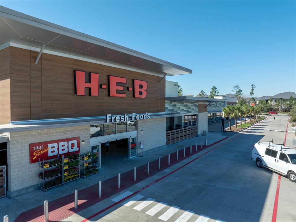 HEB, with an in-store BBQ restaurant, located directly outside of the community