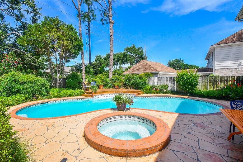 The oversized pool, surrounded by beautifully tended and lush landscapes truly a highlight of the property!