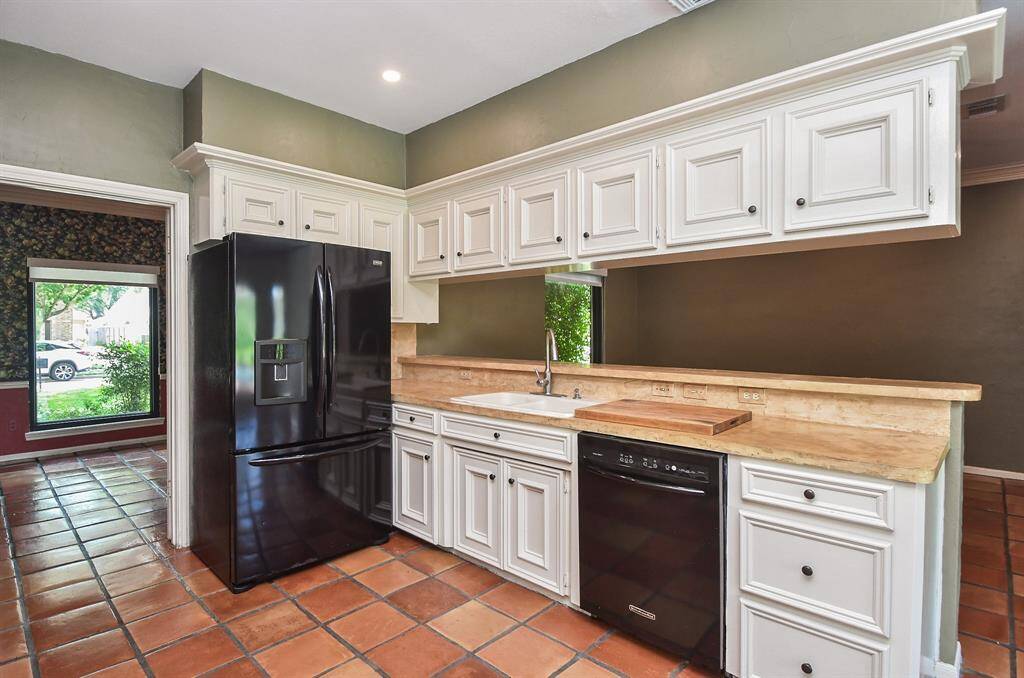 This view allows you to see the flex room or family room adjacent to the kitchen.