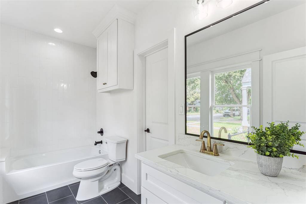 Large walk-in Laundry room w/ custom cabinetry
