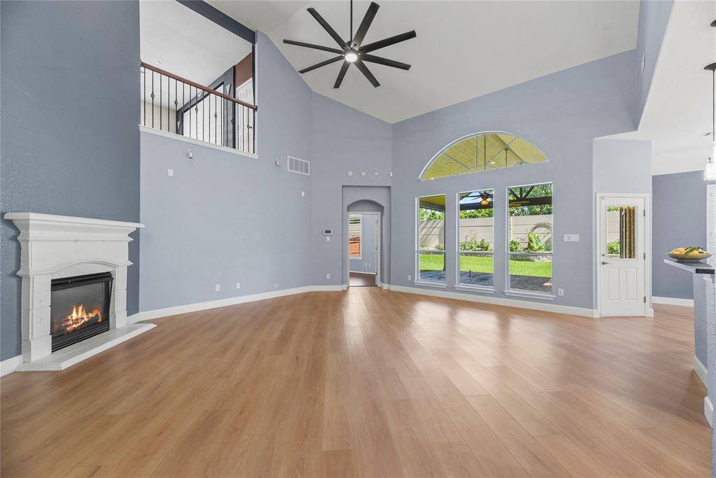 Several windows in the family room display an amazing view of the spectacular backyard!