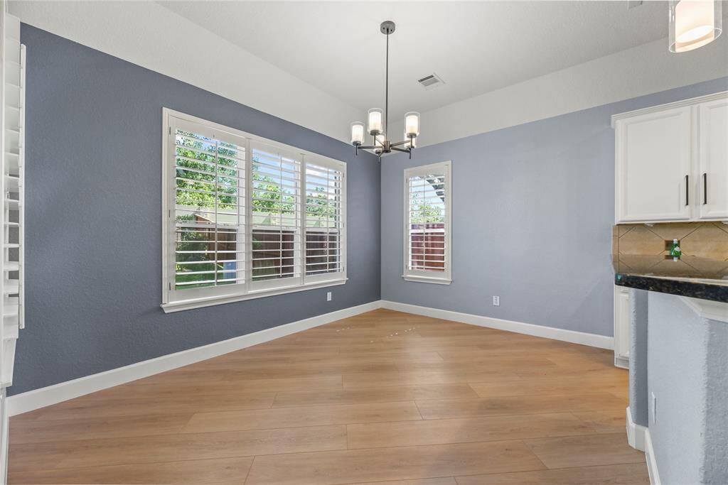 Dine in the kitchen eating area for views of the sprawling backyard!