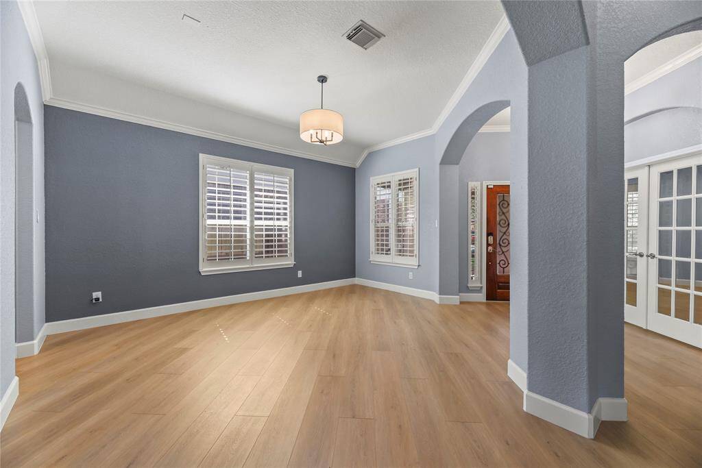 Open concept design creates an environment of possibilities. Depending on your preferences, the area can fit either a long or round table, as well as plenty of chairs.