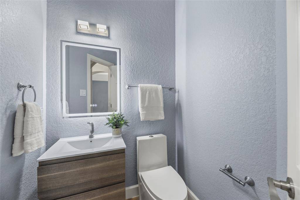 Hospitality is felt throughout the home and the powder room is no exception.