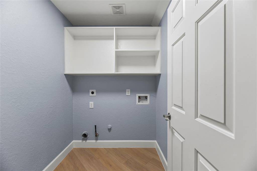 Laundry may be an ongoing chore, but in this home, it will be an easy and fun one!