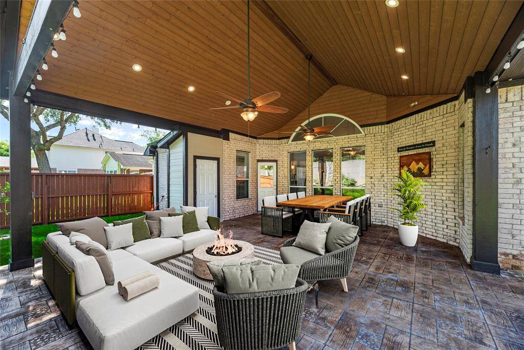 The wide patio has tons of space for al fresco dining. Chat with friends over cocktails, as the kiddos and dogs play in the fully fenced-in backyard.