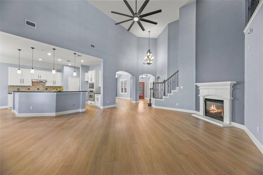 Truly open concept, the family room has clear sights to both the dining area and kitchen. Whether entertaining guests or keeping an eye on the littles, this layout delivers for modern needs and desires.