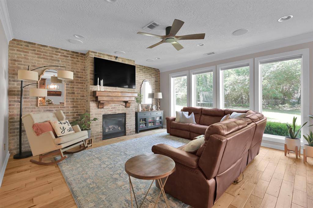 A charming fireplace that is sure to be the gathering place