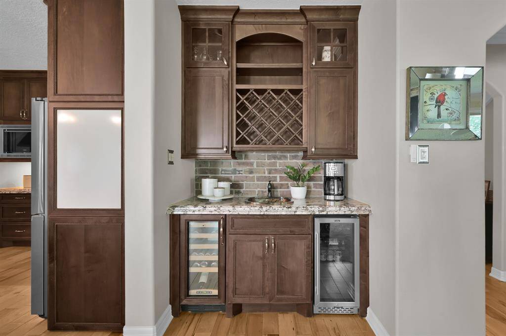 The wet bar is the perfect place to mix up a cocktail or pour your favorite cup of coffee