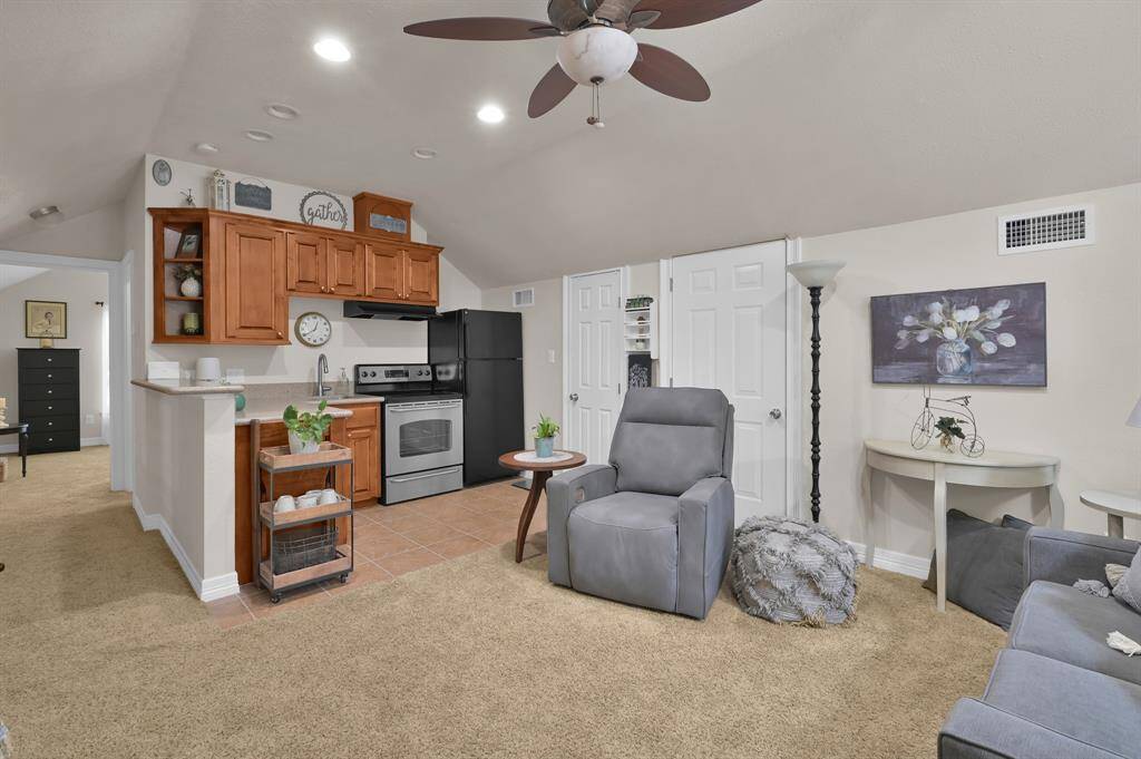 The apartment features a spacious living room, full kitchen, full bathroom and large bedroom.