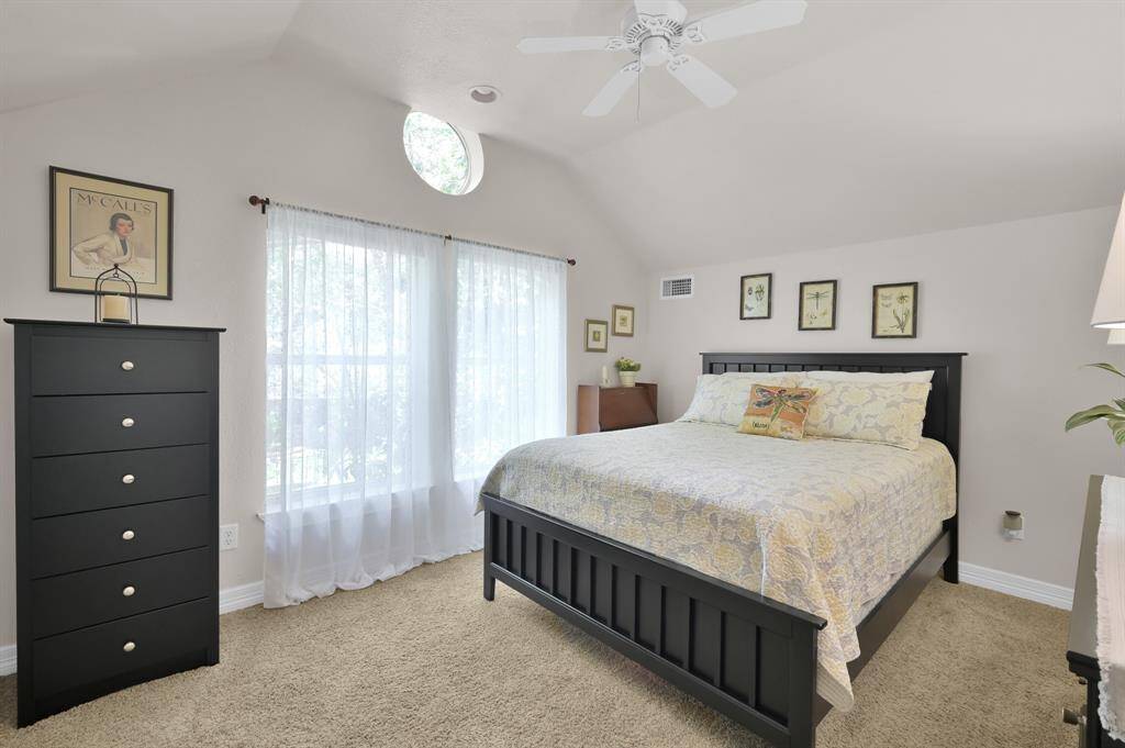 The garage apartment has a spacious bedroom ready to adorn the largest of furniture