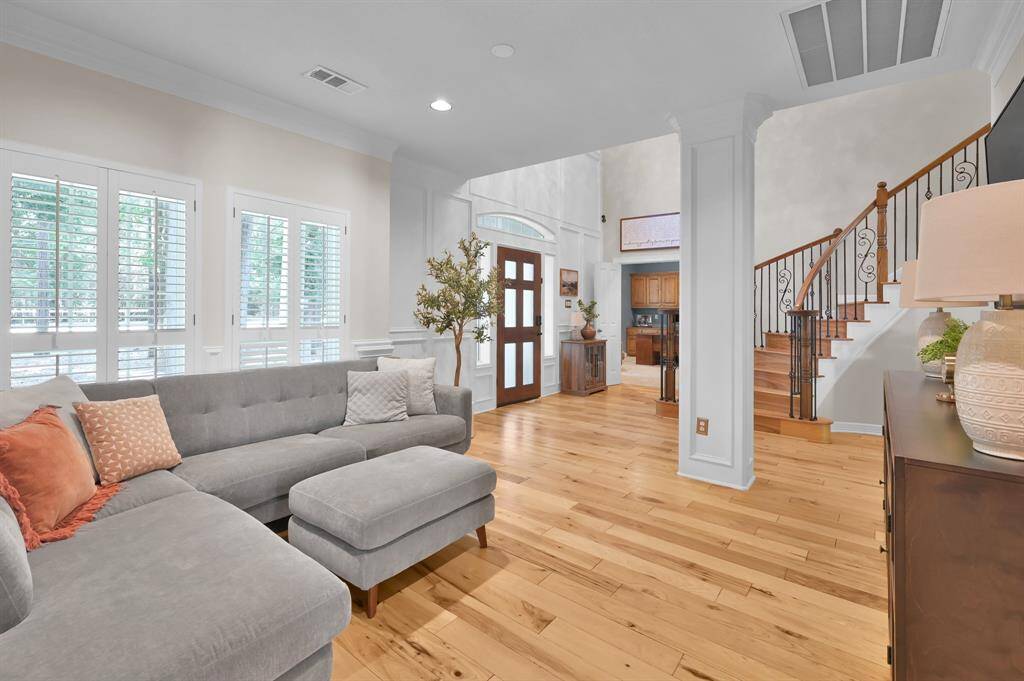 Large light inviting windows surround the home
