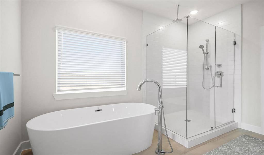 Luxurious primary bath (*Photo not of actual home and used for illustration purposes only.)