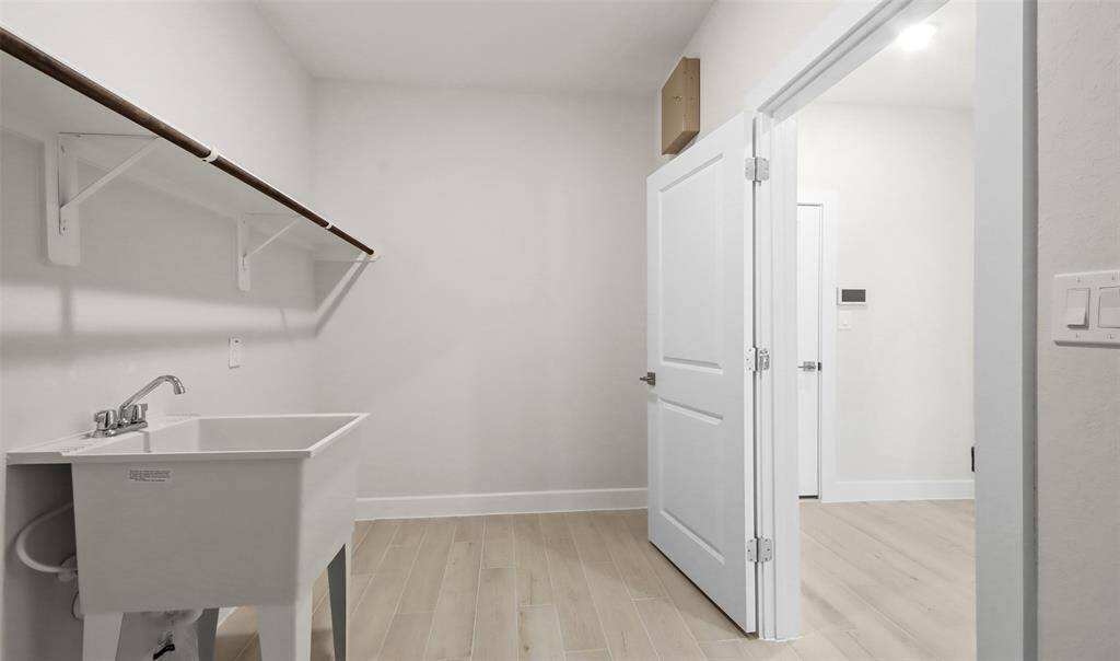 Laundry room (*Photo not of actual home and used for illustration purposes only.)