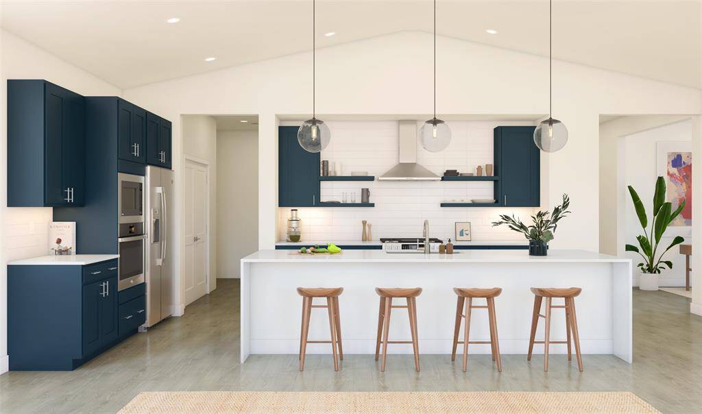 Lovely island kitchen with quartz countertops and blue cabinets. (*Artist rendering used for illustration purposes only.)