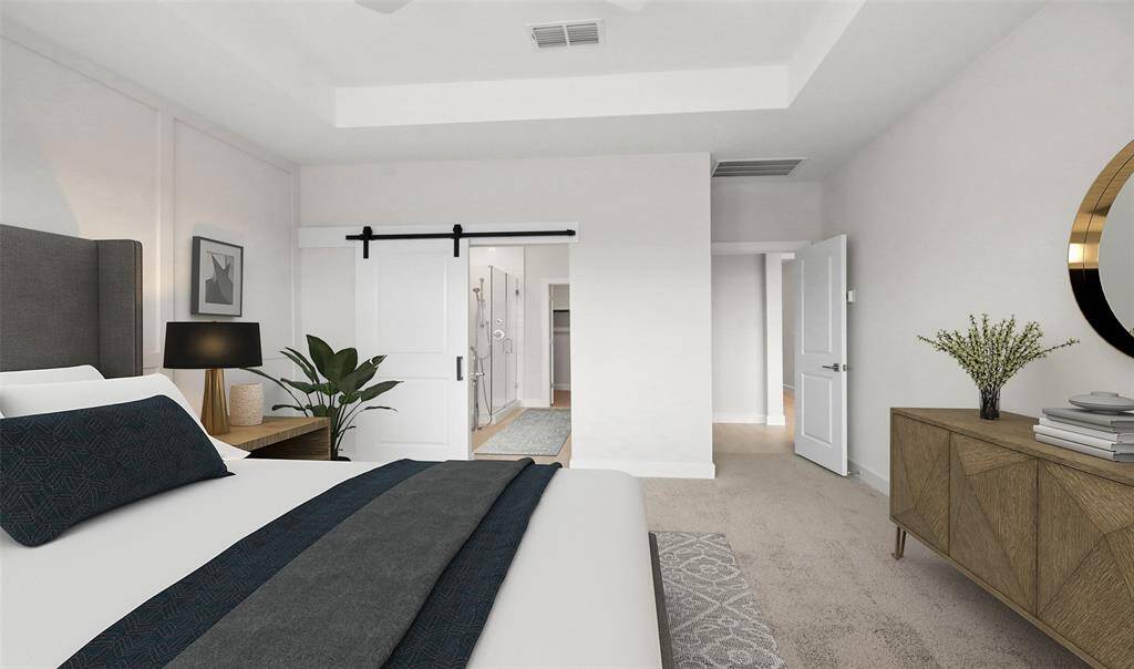 Secluded primary suite with feature wall and ceiling treatment (*Photo not of actual home and used for illustration purposes only.)