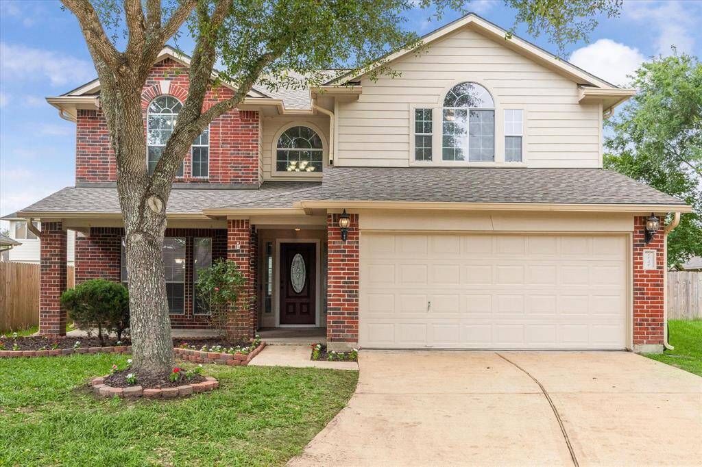 Classic red brick home with a great cul-de-sac location. NEW ROOF!