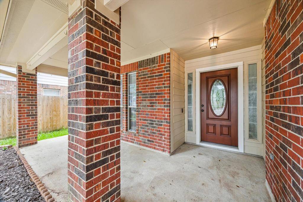 Large front porch with covered patio.