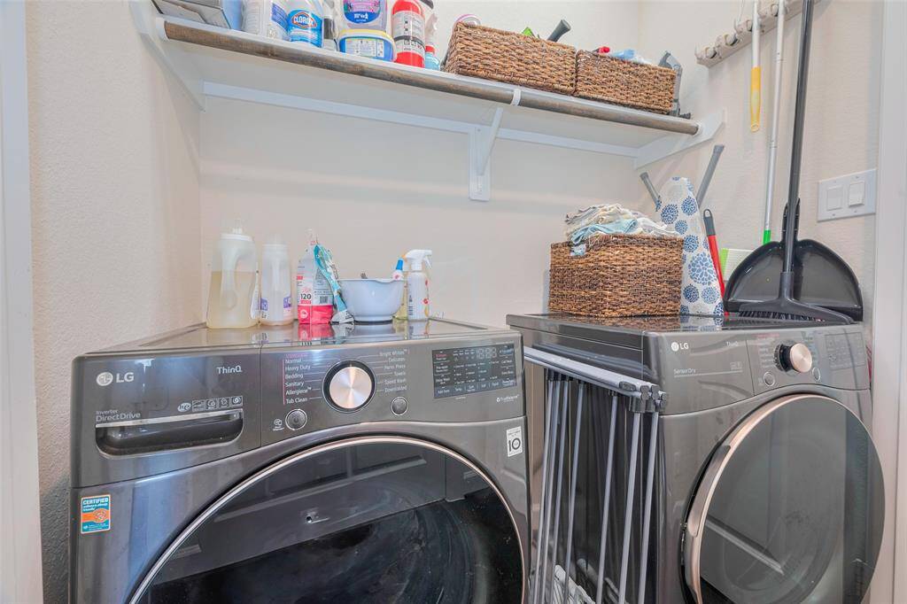 Laundry room across from 1/2 bath on 2nd floor