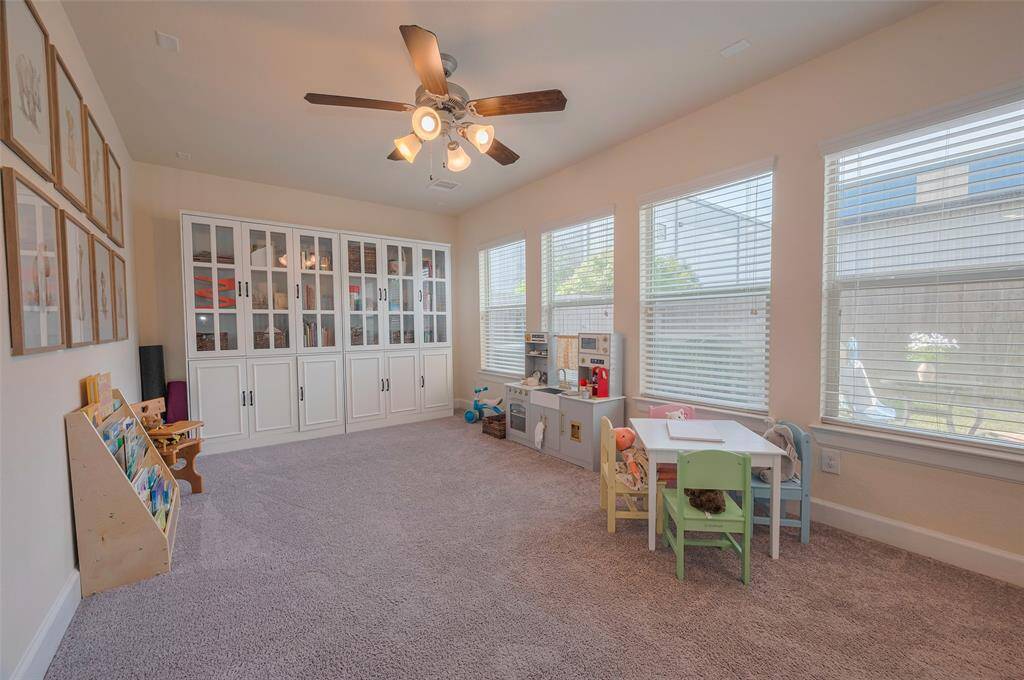 Large playroom/home office or exercise space with great view of the backyard.