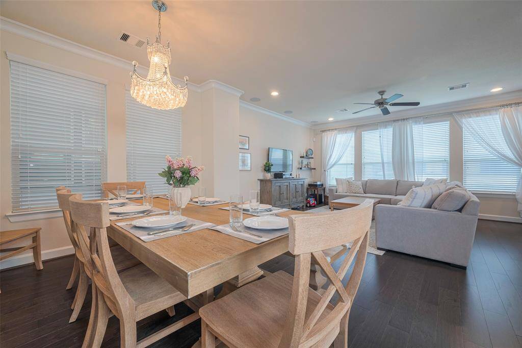 Dining space open to spacious living area.