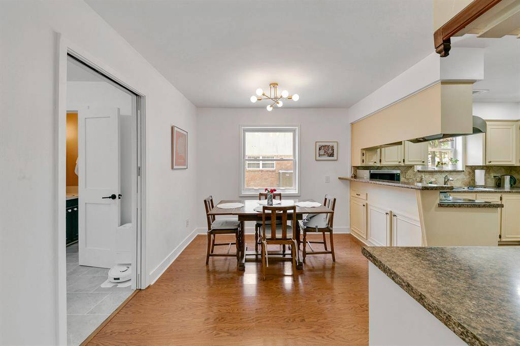 Cozy breakfast nook off the kitchen, featuring a bright window that brings in natural light.