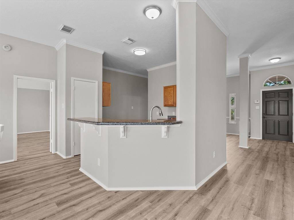 This inviting breakfast bar is perfect for enjoying casual meals with bar stools.
