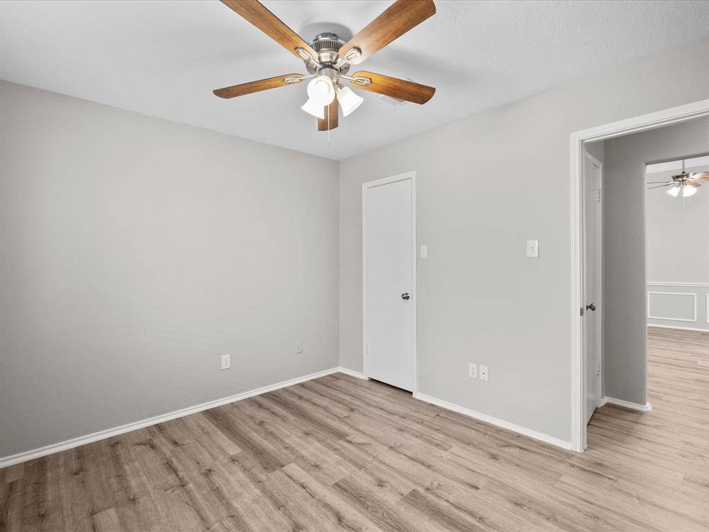 Another view of the third bedroom also has a walk in closet.